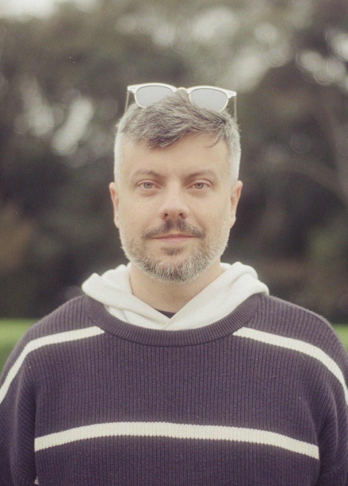 Guilherme Almeida outdoors in soft afternoon light
